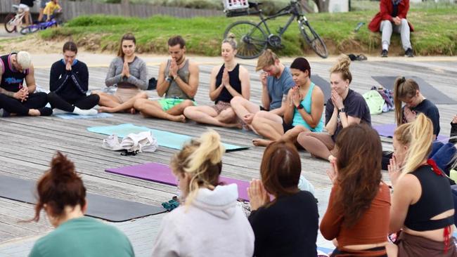 A free yoga program in St Kilda might have to be scrapped due to its popularity. Picture: Instagram