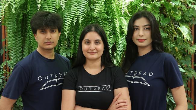 The Outread team, led by Janhvi Sirohi, middle, with Anshika Singh, left and Dhruv Sirohi, is using AI to summarise key insights from complex research publications. Picture: Supplied