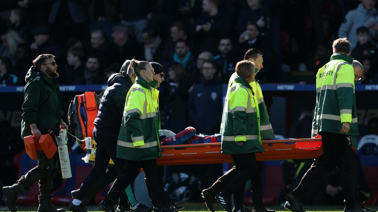 Jean-Philippe Mateta of Crystal Palace is stretchered off the pitch. Photo by Julian Finney/Getty Images.