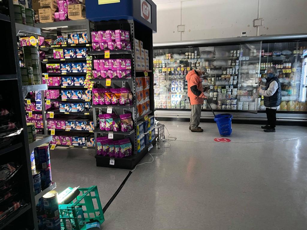 Ice was used to chill products at Romsey IGA had to after wild storms cut power. Picture: Zoe Phillips