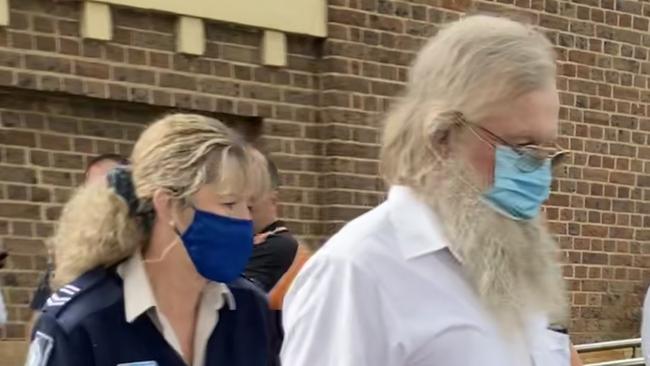 Colin Jordan leaves Picton Court in the company of an RSPCA officer during a prior court appearance. Picture: Adelaide Lang