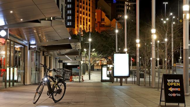 Empty streets and lots of business losses in Sydney during lockdown. Picture: Toby Zerna