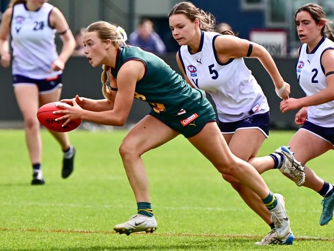 Tasmania Devils player Sophie Strong looks to get a kick away against the Geelong Falcons in the Coates Talent League. Picture: Scott Gelston / Solstice Digital.