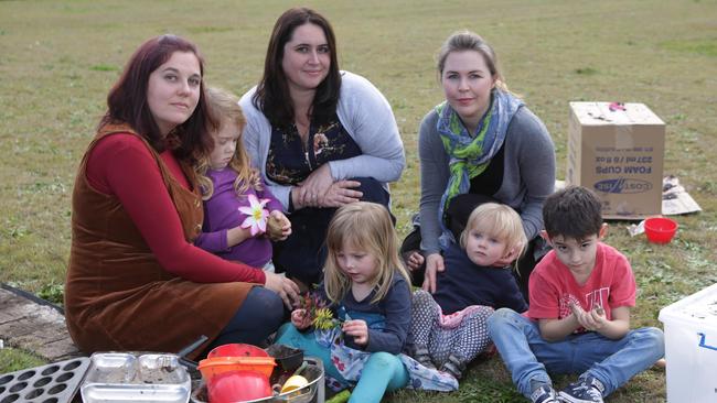 Sydney Creative Play parents Sharon Baldwin, Julia Sykes and Anna Edwards with Luella, 4, Milly, 3, Inika, 18 months and Max, 7, at the Canterbury Bowling Club site where they lease. Picture: Tim Clapin.