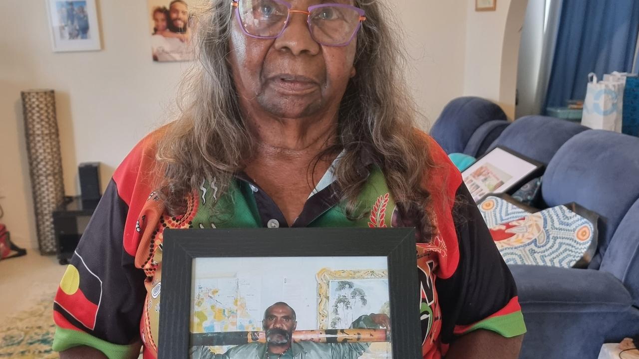 Kevin Bugmy’s sister, Doreen Webster, holds a picture of her dead brother. Picture supplied by the Aboriginal Legal Service via NCA NewsWire.