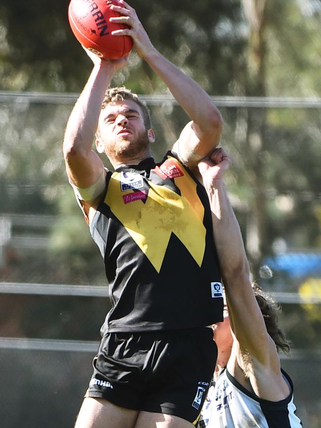 Ed Vickers-Willis takes a strong mark for Werribee. Picture: Carmelo Bazzano