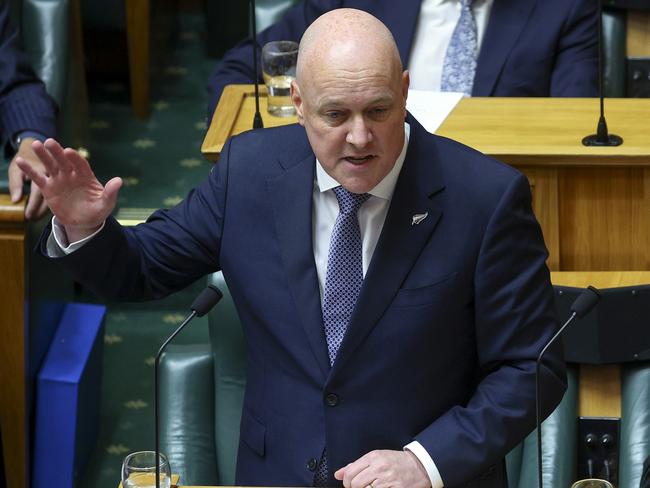 WELLINGTON, NEW ZEALAND - DECEMBER 06: Prime Minister Christopher Luxon speaks while Deputy Prime Minister and New Zealand First Leader Winston Peters looks on following the State Opening of Parliament on December 06, 2023 in Wellington, New Zealand. The ministers of the 54th Parliament were sworn in on November 27th, 2023, after a lengthy delay in forming a governing coalition between The National Party, ACT and New Zealand First. (Photo by Hagen Hopkins/Getty Images)