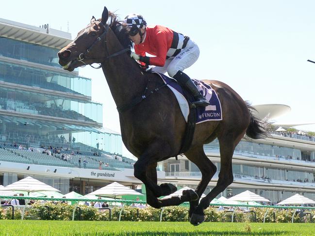 Revelare ridden by Ryan Hurdle wins the Racing and Sports 2000 at Flemington Racecourse on March 01, 2025 in Flemington, Australia. (Photo by Brett Holburt/Racing Photos via Getty Images)