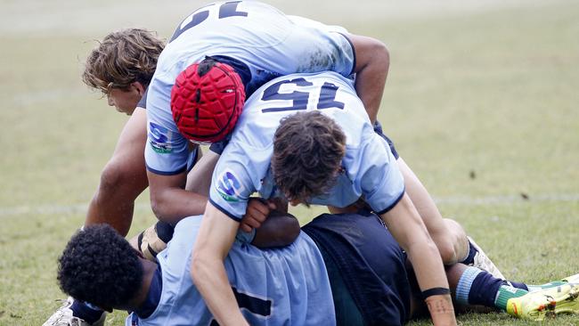 Ofa Latu, Jack Kalms and Samuela Sorovi for the Waratahs. Under 16s at Leichhardt Oval. Picture: John Appleyard.