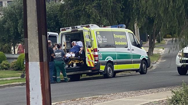 A person is loaded into an ambulance at Newton. Picture: Patrick James