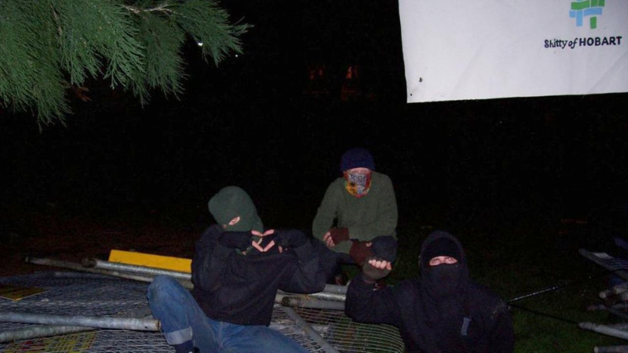 Members of Grassroots Action Network Tasmania dismantled a hundred metres of steel fencing around the giant trees in St David's Park in solidarity with community members sleeping rough. Picture: Grassroots Action Network Tasmania.