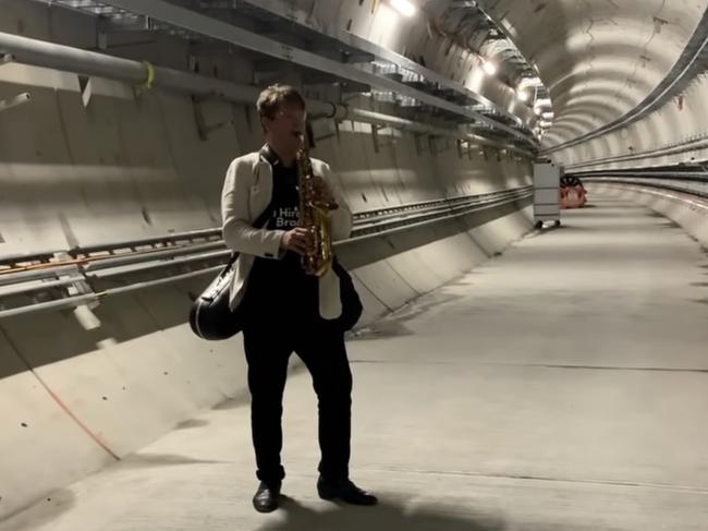 Saxophonist Sam Boon belting out a tune to a captive audience.