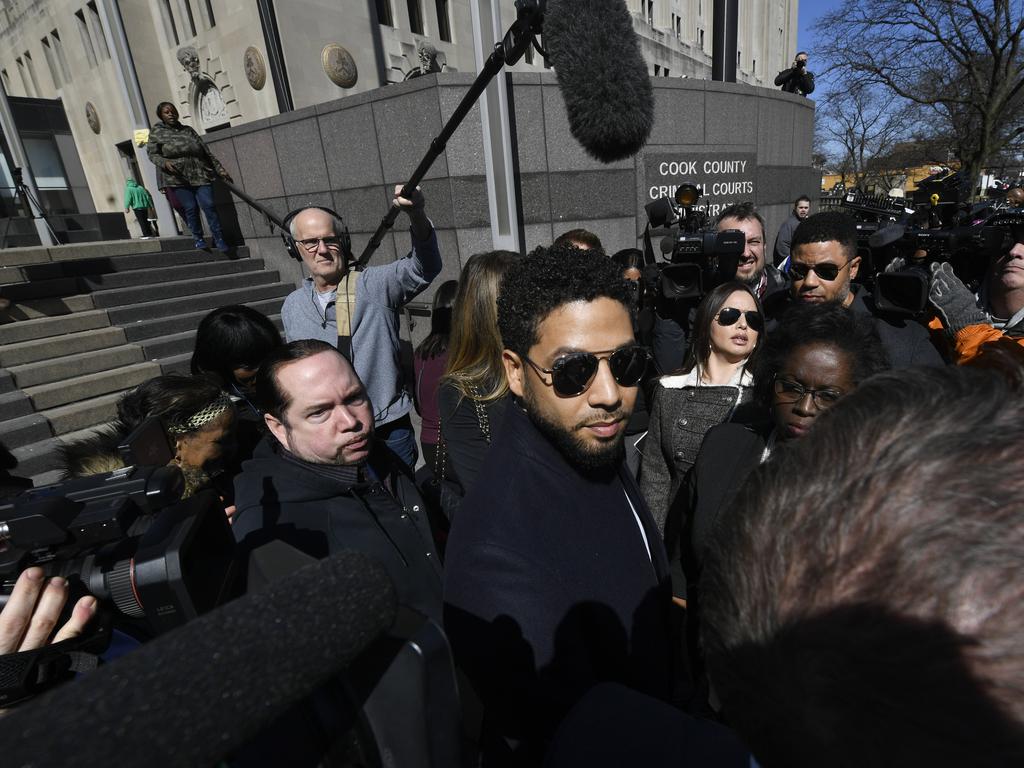 Actor Jussie Smollett is flanked by media after he leaves court in Chicago. Picture: AP