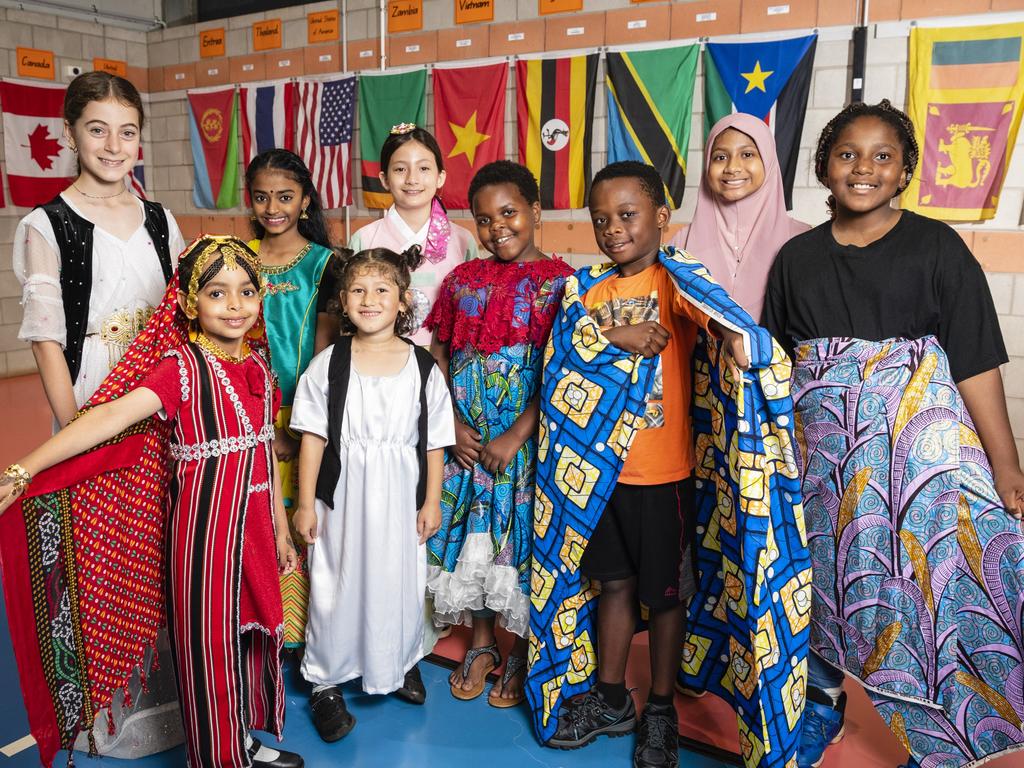 Representing their culture are (from left) Ramona Hamad, Chum Ibrahim, Divyaa Pathmanaban, Erivan Ajo, Hanee Armstrong, Faith Bahati, Dieume Antoine, Ayesha Muktadir and Anna Ndule at Harmony Day celebrations at Darling Heights State School. Picture: Kevin Farmer