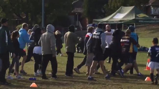 The fight broke out after a contentious decision in an under-7s rugby league match