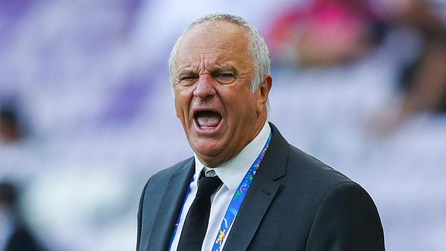 Graham Arnold barks orders from the sideline during Australia’s loss to Jordan last week. Picture: Getty Images