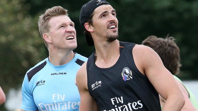 Collingwood captain Scott Pendlebury pips his coach Nathan Buckley. Picture by George Salpigtidis