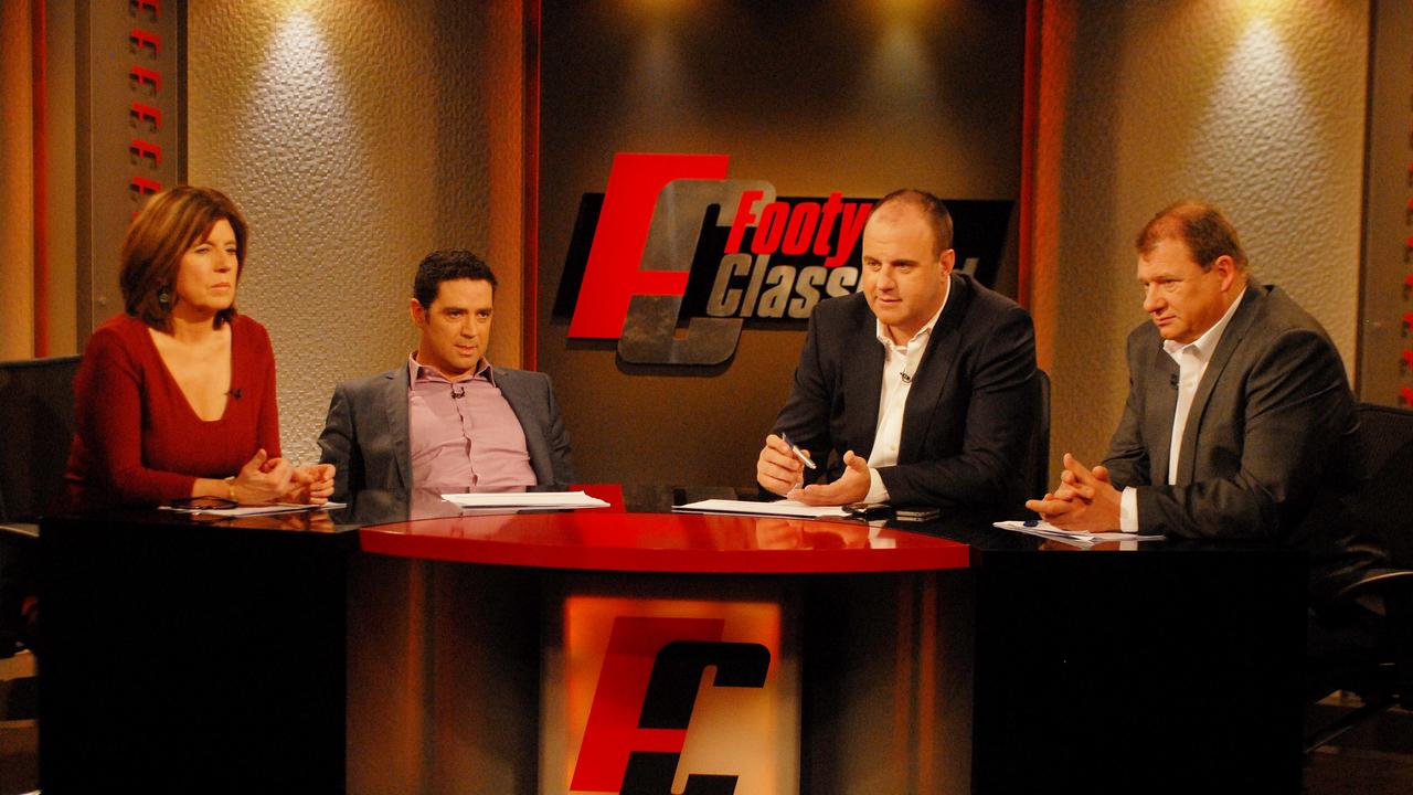Caroline Wilson, Garry Lyon, Craig Hutchison and Grant Thomas on the set of TV show Footy Classified