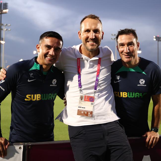 Former Socceroos Tim Cahill and Tony Vidmar pose with former teammate Mark Schwarzer during the Australia training session.