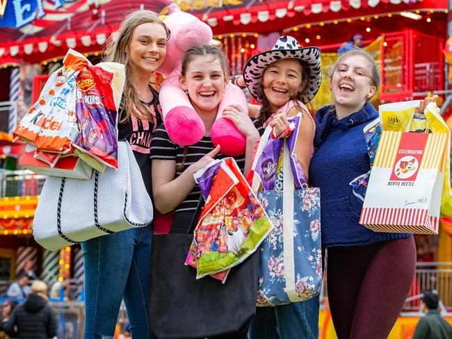 Friends Tara, 17, Sarah, 16, Elentari, 16, and Louise Casey, 17, load up on showbags. Picture: Sarah Matray