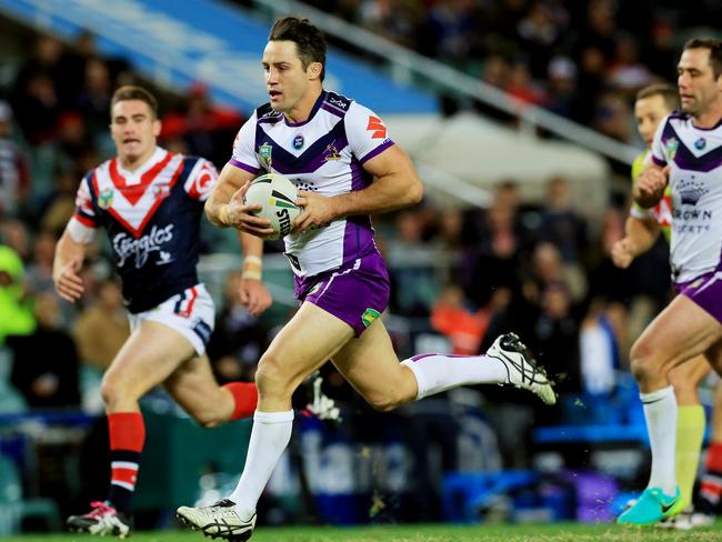 Cooper Cronk of the Storm on his way to a try  during the Sydney Roosters v Melbourne Storm NRL round 14 game at Allianz Stadium, Sydney.pic Mark Evans