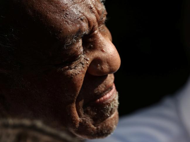 Cosby was emotional as he stood outside his home and listened to his lawyer speak to media. Picture: Reuters.