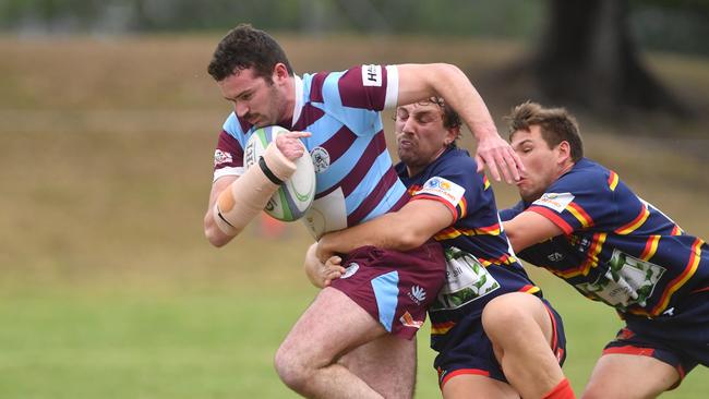 Teachers West against North Ward in Townsville District Rugby Union Preliminary Final 2022 at Mike Carney Toyota Park. Teachers Hewey Scott and North's Mitchell Clark and Sam Bradley. Picture: Evan Morgan