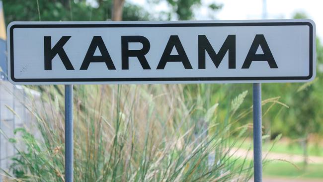 Private security officers and a dog, funded by the NT Government, patrol around Karama and Malak every night between 5pm and 1am. Picture: Glenn Campbell