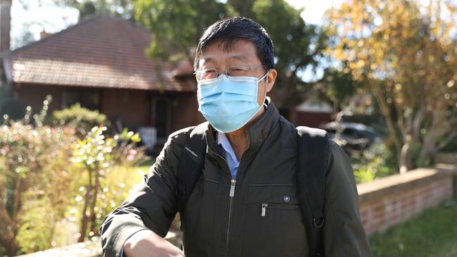 Mr Charles Gu at the front of his home. Picture: John Grainger