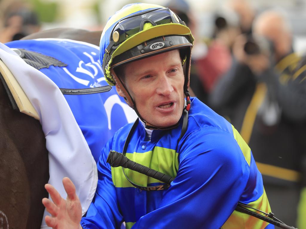 Mark Zahra after a win on Ideas Man on Cox Plate Day. (Photo by Mark Evans/Getty Images)