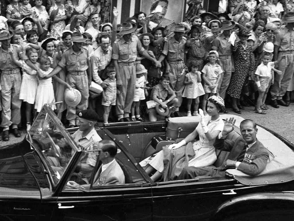 The Royals wave to the crowds as they arrive at City Hall, Brisbane. Picture: File