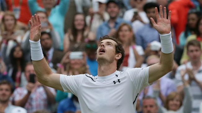 Andy Murray of Britain celebrates after defeating Jo-Wilfried Tsonga of France during their men's singles quarterfinal match.