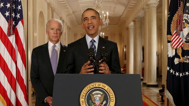 US President Barack Obama, standing with Vice President Joe Biden, delivers remarks on in the East Room of the White House in Washington after an Iran nuclear deal was reached. Picture: AFP