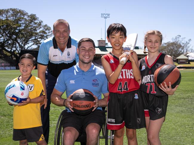 Left to right: Jordan Miletic of the U8 Bulls FC Academy, Softball NSW CEO Stuart Clarke, Stephan Rochecouste of Wheelchair Sports NSW, Jean Hong and Emma Fogale of Northern Suburbs Basketball Association. Picture: Brendan Read