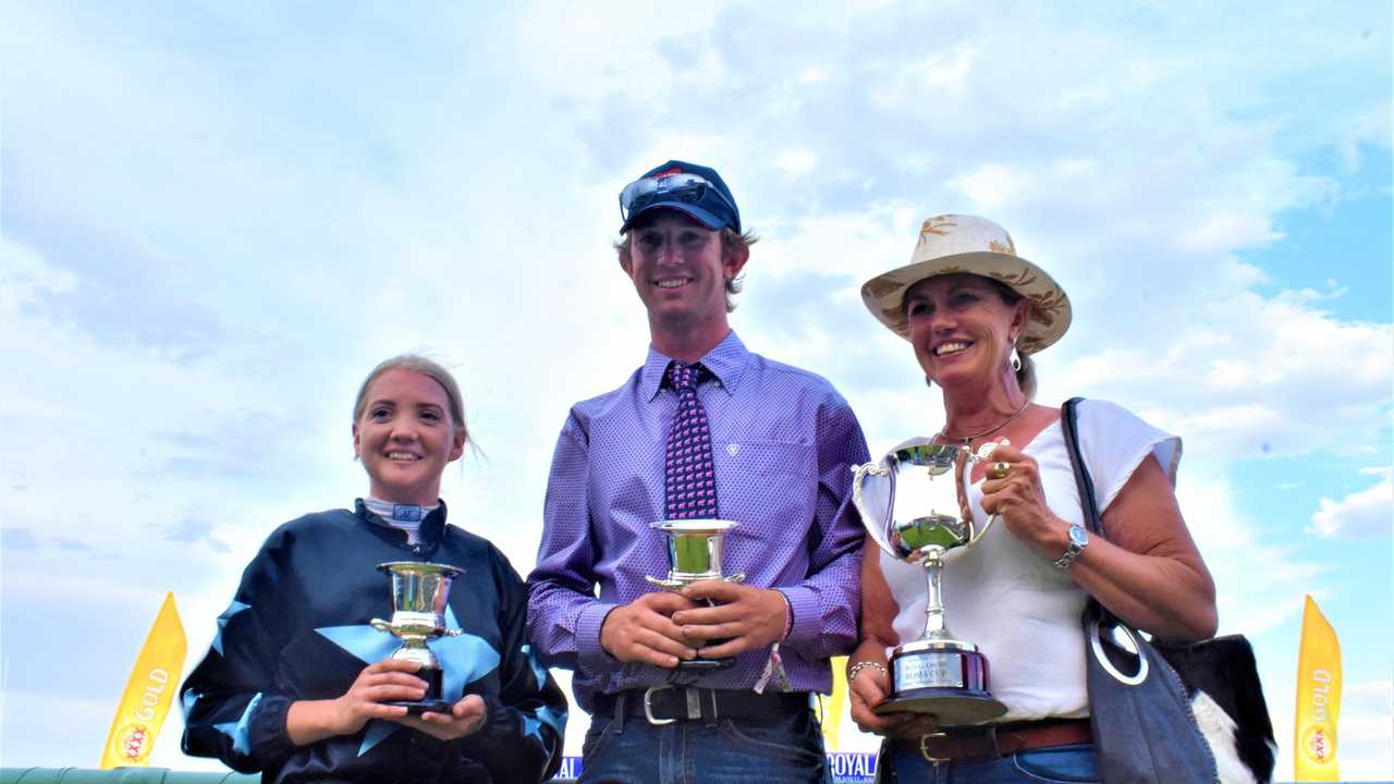 GRINNING WINNERS: Brooke Richardson with connections to the winning horse, Atouchmore. Picture: Jorja McDonnell