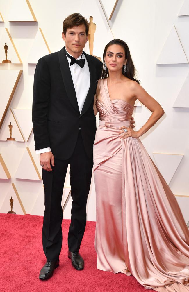 US actor Ashton Kutcher and wife US actress Mila Kunis attend the 94th Oscars. Picture: AFP