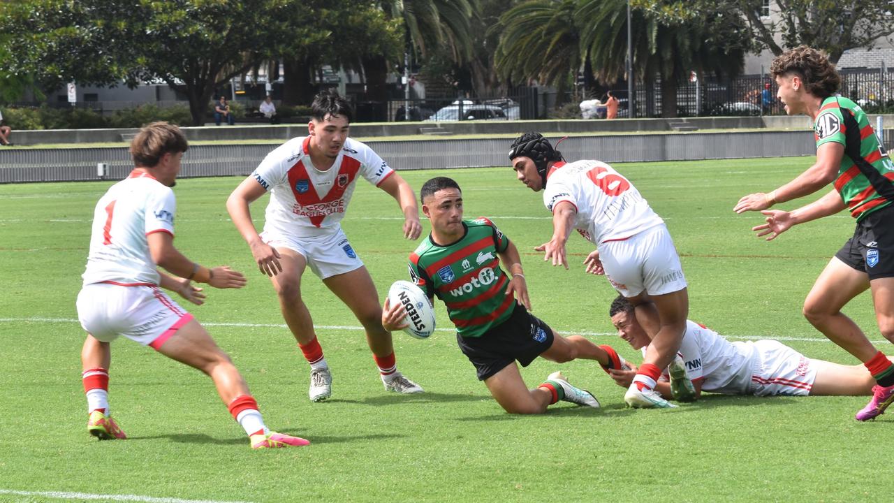 James Davies looks to pass to Asher Pung. Picture: Sean Teuma