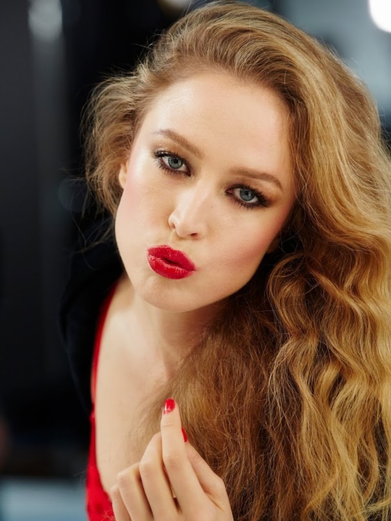 Brazilian model Raquel Zimmermann, a known must of Karl Largerfeld, puts her cherry-red pout forward for the behind the scenes shoot backstage of 2015 Pirelli Calendar by Steven Meisel, image by Marc Regas, styled by Carine Roitfeld. Credits: Hair Stylist Guido Palau Makeup Artist Pat McGrath Set Designer Mary Howard Casting Director Jennifer Starr Producer Camilla Johnson Hill