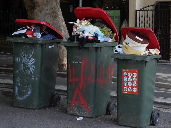 SYDNEY, AUSTRALIA - Newswire photos FEBUARY 08 2022: A view of bins out full of rubbish waiting to be emptied in Surry Hills as the waste workers strike continues leaving the streets of the city of Sydney overrun with rubbish. Picture: NCA Newswire / Gaye Gerard