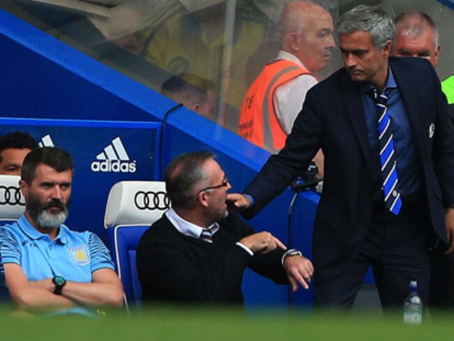 Jose Mourinho gets a terse reaction from an irate Paul Lambert.