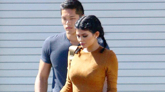 Kylie Jenner being shadowed by Tim Chung. Picture: Splash News