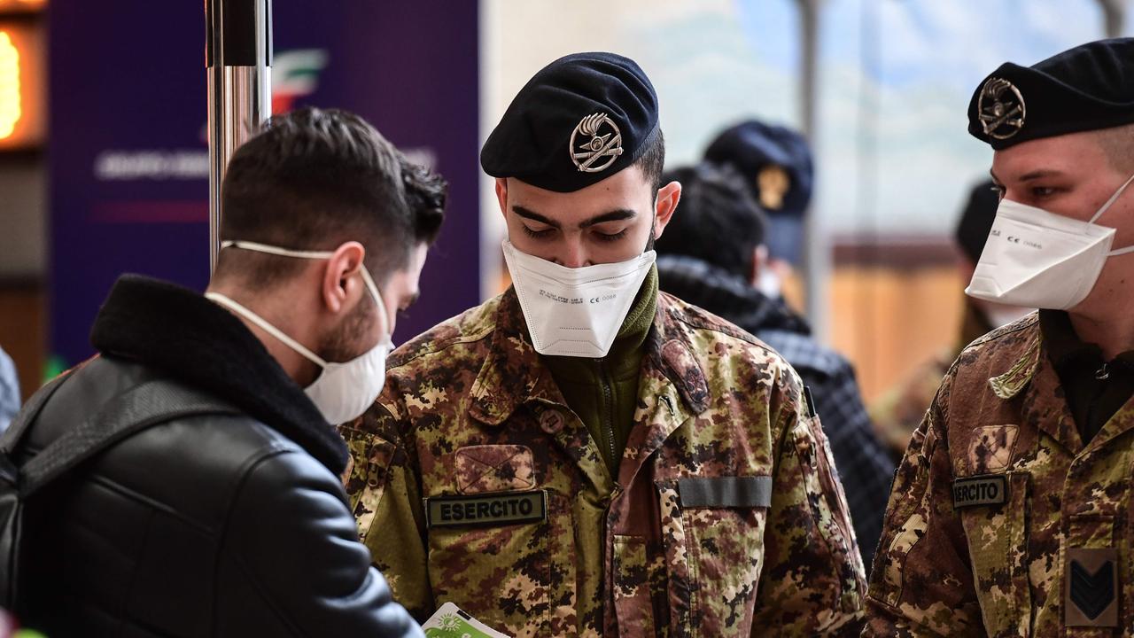 Italy’s death toll has risen by 97 in a single day, with disturbing photos showing patients hooked onto life support machines in hospital. Source: Reuters. (Photo by Miguel MEDINA / AFP)