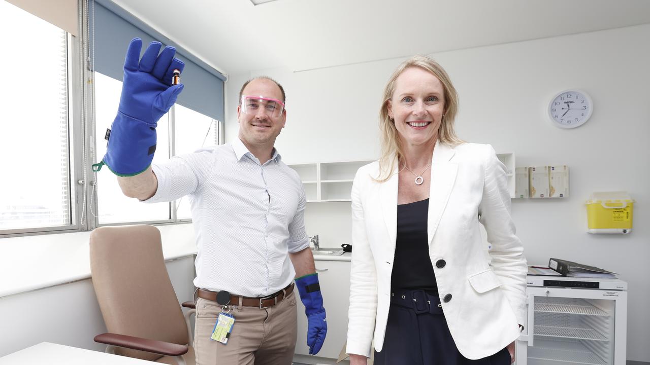 Health Minister Sarah Courtney alongside site pharmacist at the Royal Hobart Hospital Duncan McKenzie as he holds a test vial in the new Royal Hobart Hospital COVID-19 vaccination hub. Picture: Zak Simmonds