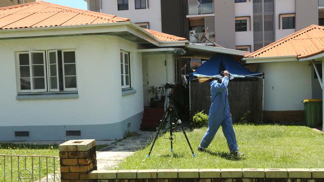 Forensic officers at Paania Lawrence’s home the day of the alleged murder. Picture: Mike Batterham