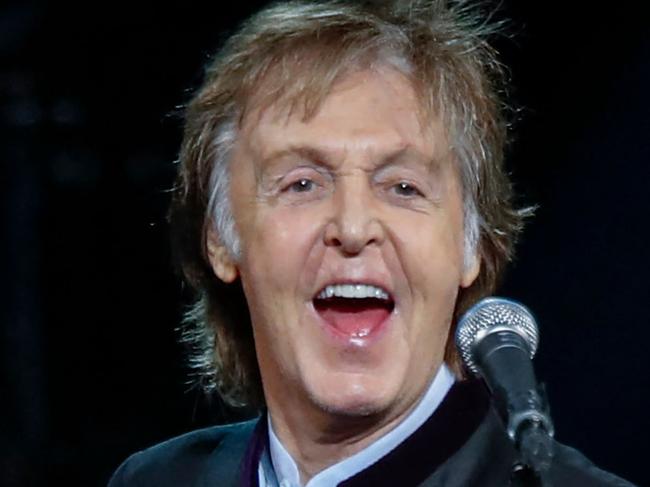 (FILES) In this file photo taken on July 27, 2017 British musician Paul McCartney performs during a concert as part of his One on One tour at the Hollywood Casino Amphitheatre in Tinley Park, Illinois. - Paul McCartney will celebrate his 80th birthday on June 18, 2022. (Photo by Kamil Krzaczynski / AFP)