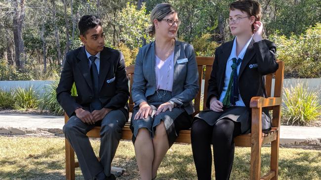 Queensland Academies Health Sciences Campus Year 10 students Nathan Nunes and Mandisa Hargraves speaking with Principal Vanessa Rebgetz.