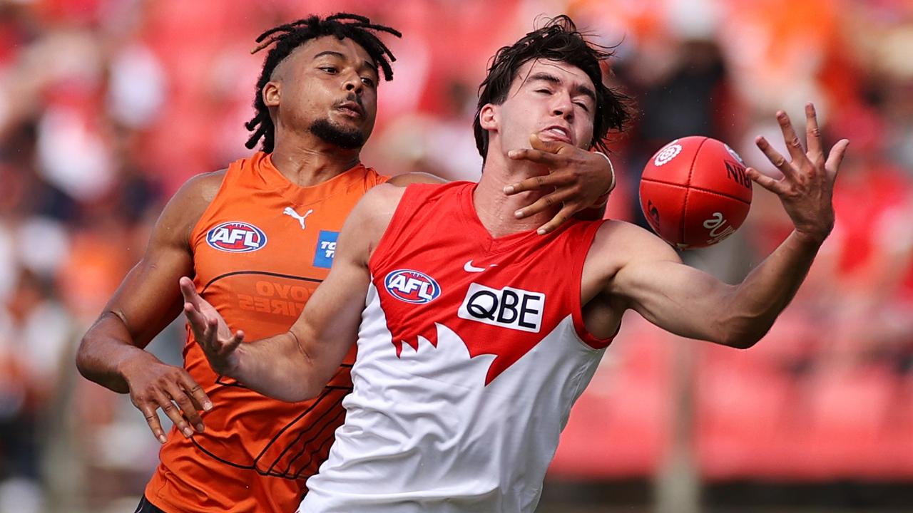 Swans forward Logan McDonald marks ahead of Connor Idun.