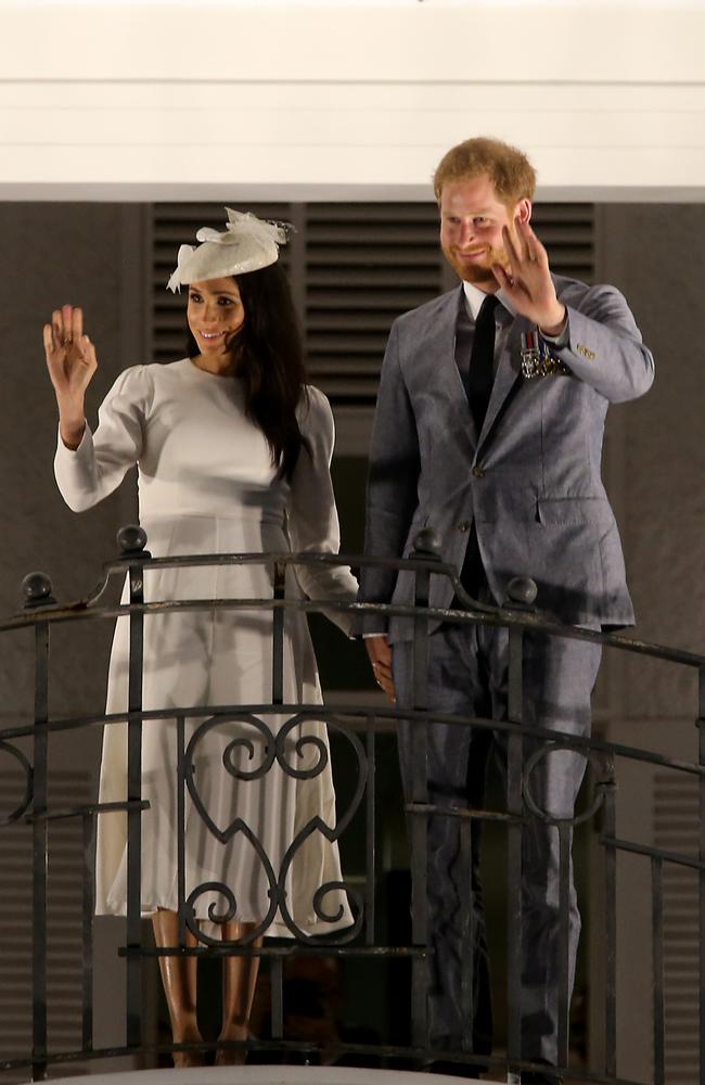 Harry and Meghan on the balcony of the Grand Pacific Hotel in Suva on day one of their tour of Fiji. Picture Nathan Edwards