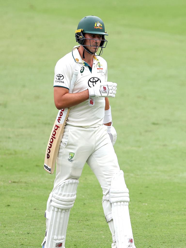 Pat Cummins of Australia is dismissed during day four of the Gabba Test. Picture: Pat Hoelscher / AFP.