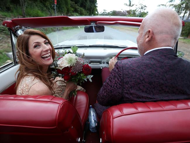 The happy couple head off for a new life together. Picture: Liam Kidston